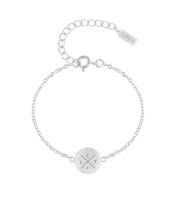 IBI X bracelet from byRavn in silver-coloured stainless steel, round disc with cross and the initials "C", "L", "T", "F" engraved