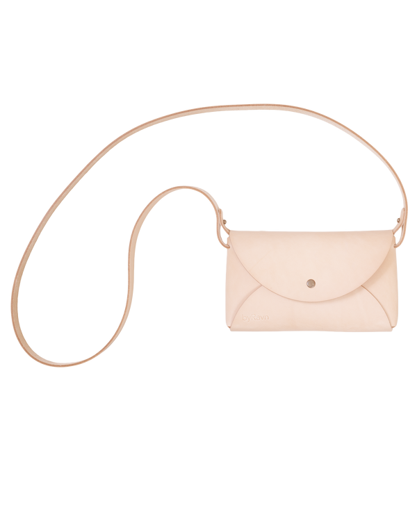 INA shoulder bag from byRavn in natural leather with long narrow strap and steel press-stud closure
