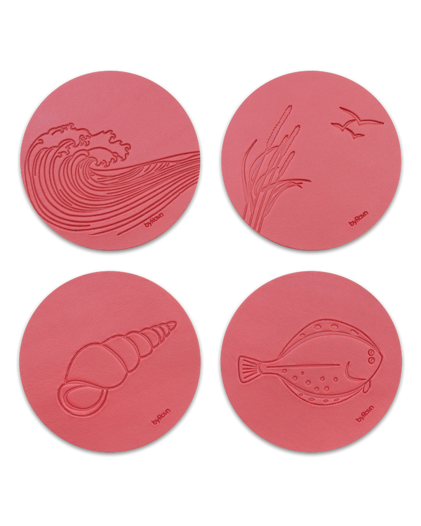 MOKKA summer house leather coasters from byRavn in red, 4 motifs: wave, marram grass with seagulls, conch shell and flatfish