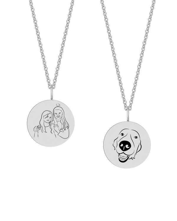 SIA PORTRAIT necklace from byRavn in silver-coloured steel, two round pendants with line-drawn portrait of two women and a dog