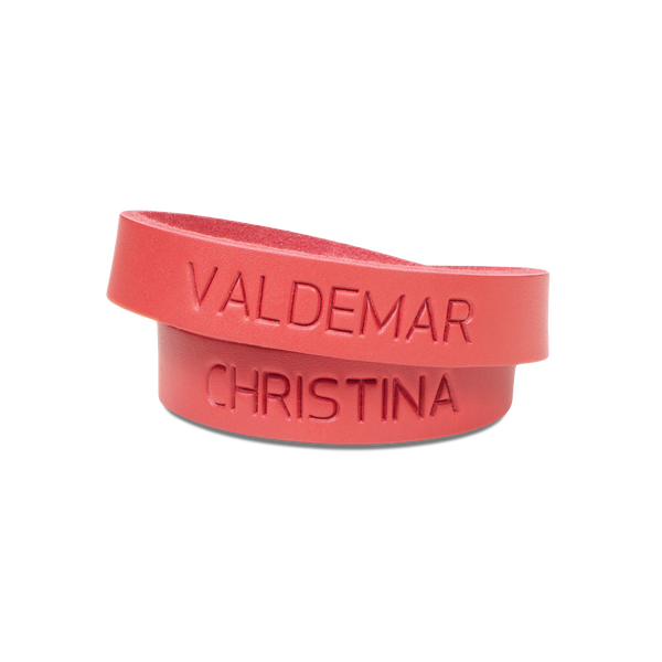 DUO leather bracelet from byRavn in red full-grain leather with the names "Valdemar" and "Christina" engraved on each wrap
