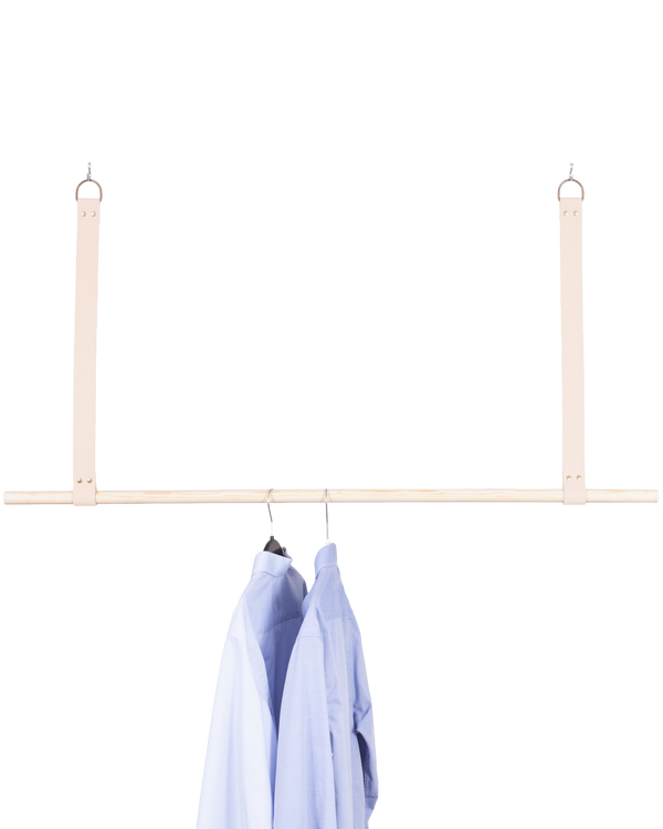 HOLD 30 leather hanging straps from byRavn in natural with D-ring, wooden clothes rail and light blue shirts