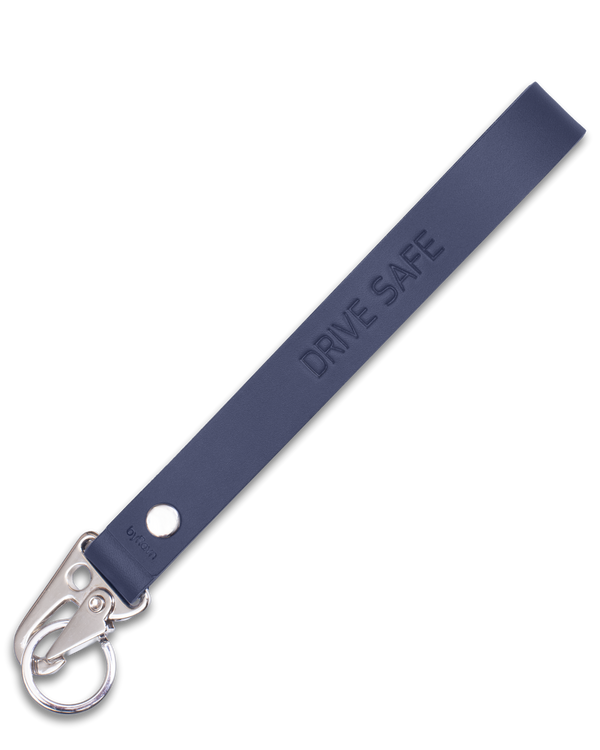 IRON leather keyring from byRavn in navy blue with long strap, steel carabiner and the engraving "Drive safe"