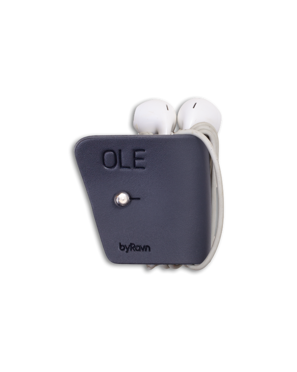 KAX leather earbud holder from byRavn in black with steel sam browne stud and the name "Ole" engraved, with earpods