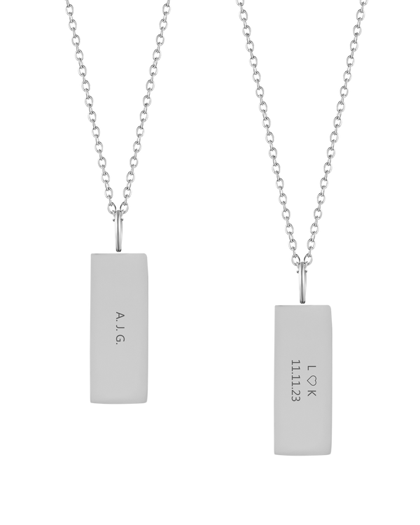 MIO necklace from byRavn in silver-coloured stainless steel, two rectangular pendants engraved with initials "A.J.G." and "L ♡ K 11.11.23"