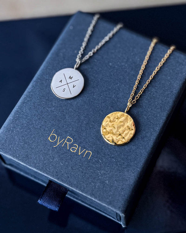 MOON X necklace in silver-coloured stainless steel with cross and initials "M V S A" engraved, with hammered gold-plated coin on byRavn box
