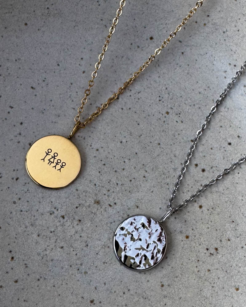 MOON STICK necklace in gold-plated stainless steel engraved with matchstick family of four, with silver-coloured hammered coin on concrete