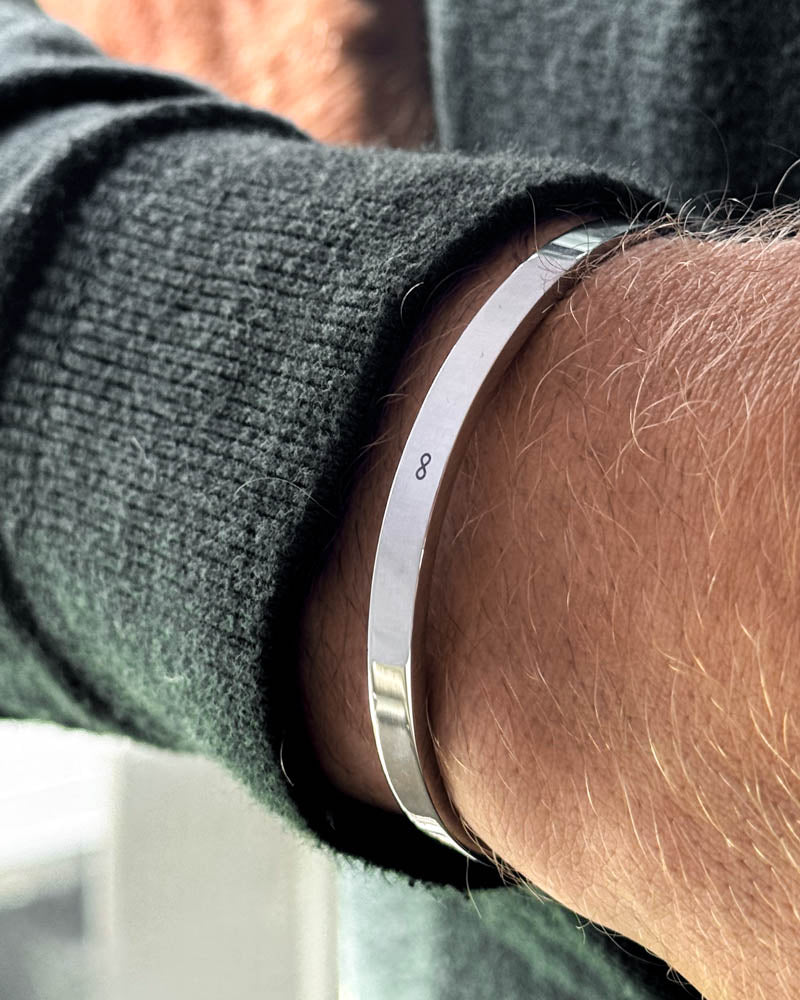 MARS bracelet in silver-coloured stainless steel with infinity symbol ∞ engraved on the wrist, dark green knit