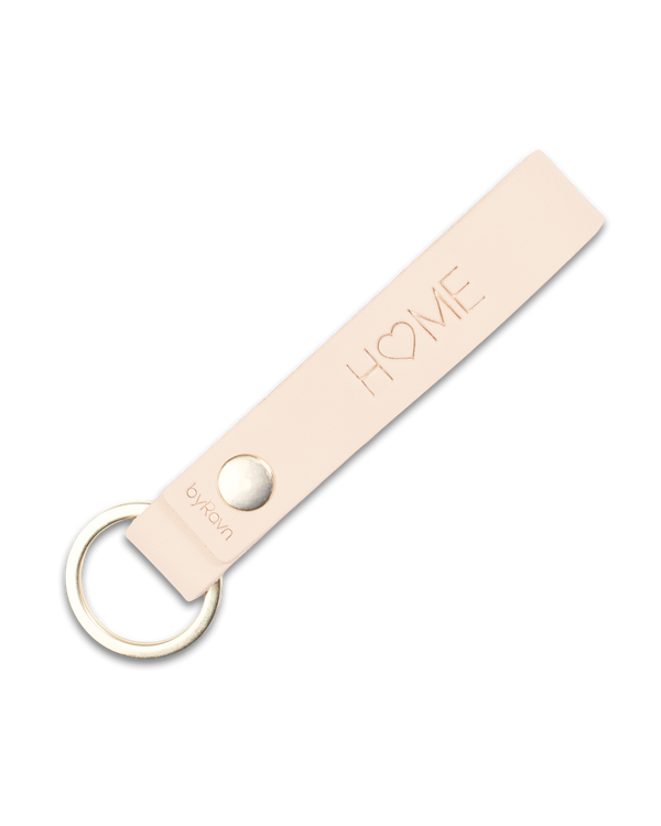 RAVN leather keyring from byRavn in natural with steel key ring and the engraving "Home" with a heart as the O