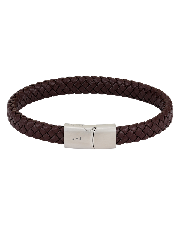 RAY leather bracelet from byRavn in dark brown braided leather with steel magnetic clasp and the initials "S + J" engraved