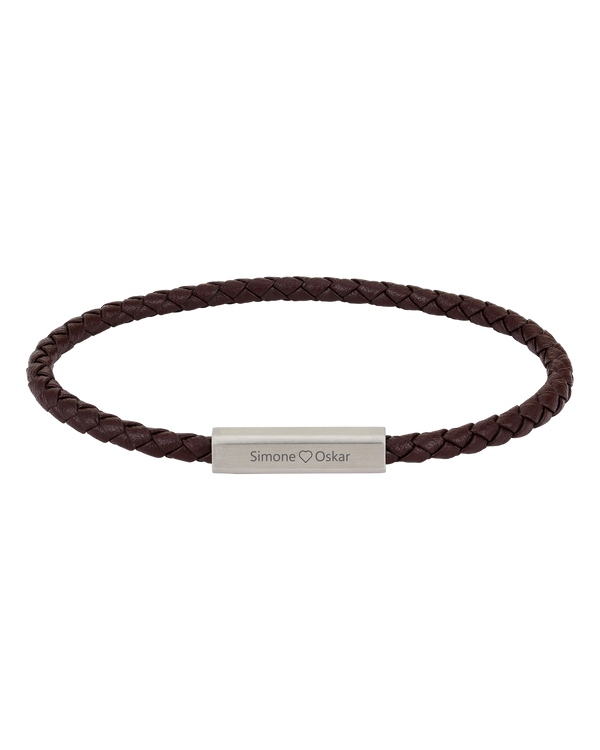 RIO leather bracelet from byRavn in dark brown braided leather with steel clasp and the engraving "Simone ♡ Oskar"