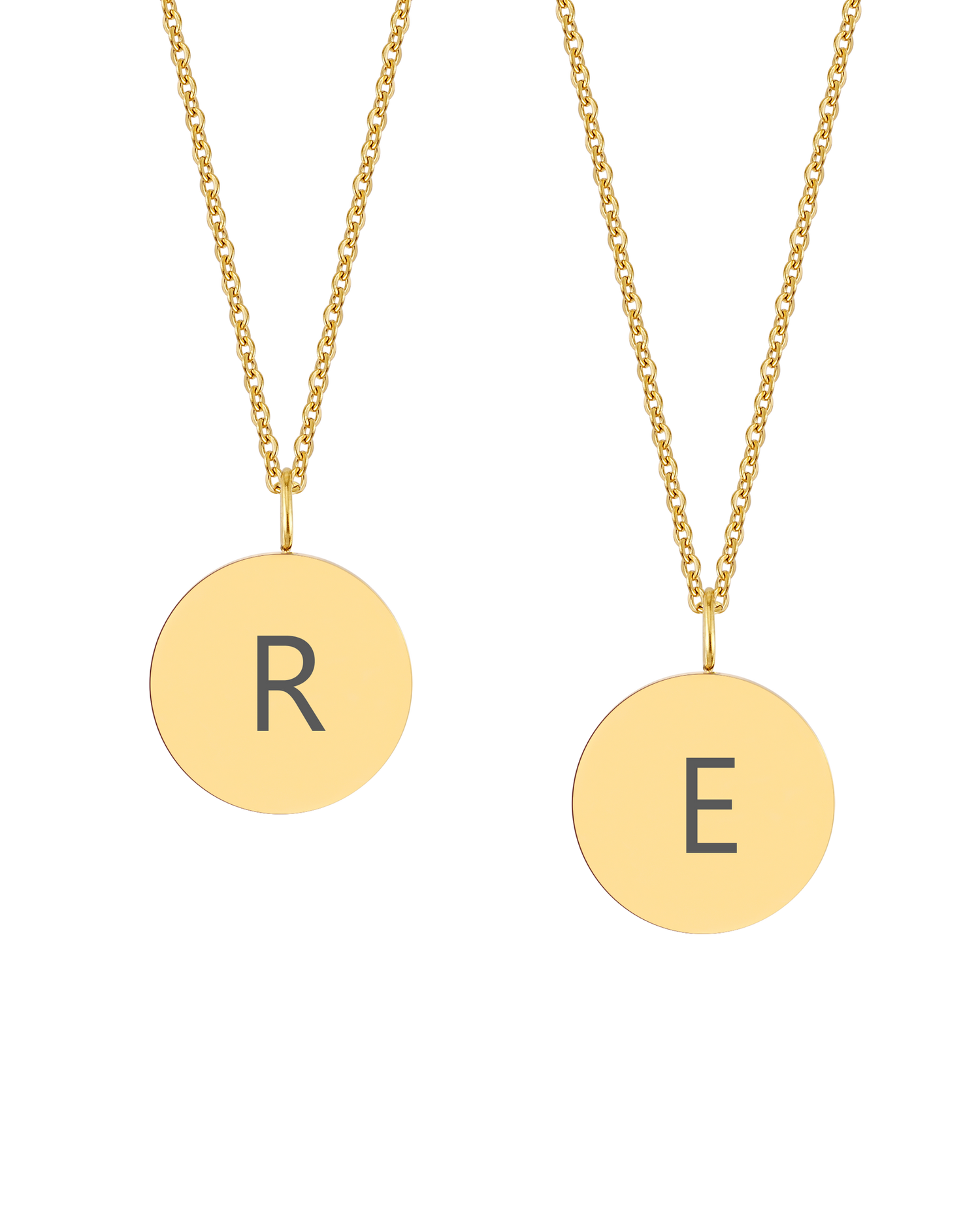 SIA LETTER necklace from byRavn in gold-plated stainless steel, two round pendants engraved with the capital letters "R" and "E"