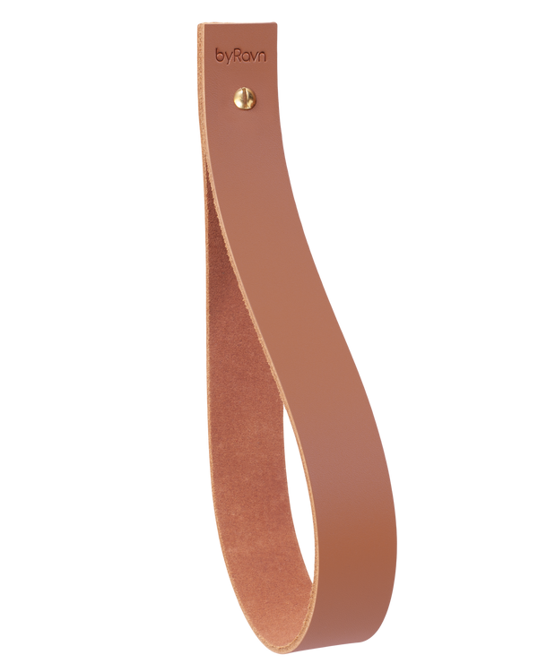 STACK leather magazine holder from byRavn in cognac, loop with brass screw and byRavn embossing