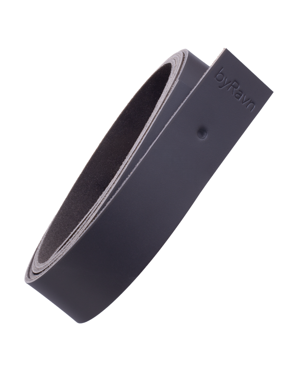 WAVE leather strap from byRavn in black full-grain leather, rolled up, with byRavn embossing and mounting hole